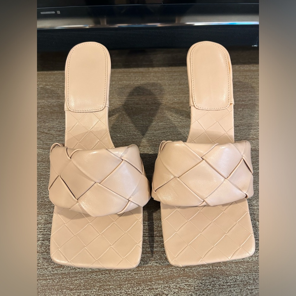 Neutral heeled mules. Trendy basket weave.